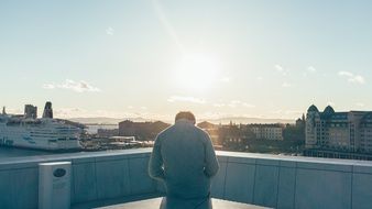 man on the ship at sunset