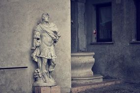 Roman statue of a soldier as a facade decoration