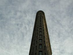 skyscraper in new york under white clouds