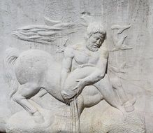Beautiful ornament on the wall in the form of a centaur