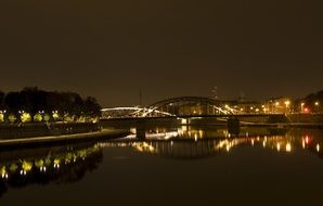 bridge over the river in krakow at night