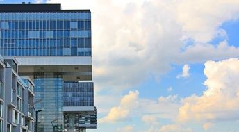 glass building by the river rhine