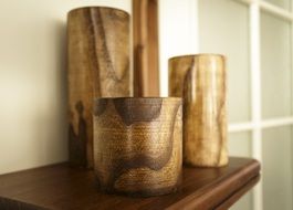 different wooden candle holders
