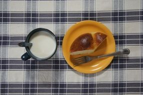 top view of milk and bun for a breakfast