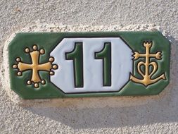 house number 11 on the wall