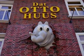 funny animal on the facade of an old building in east friesia