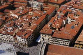 aerial view of buildings with red roofs