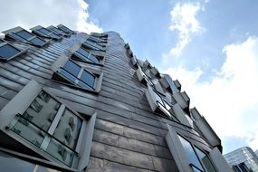high rise building architecture with slanting windows