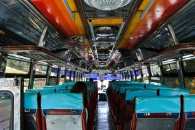 blue lining on the seats in the tourist bus