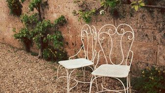 classic chairs as a decoration of the garden