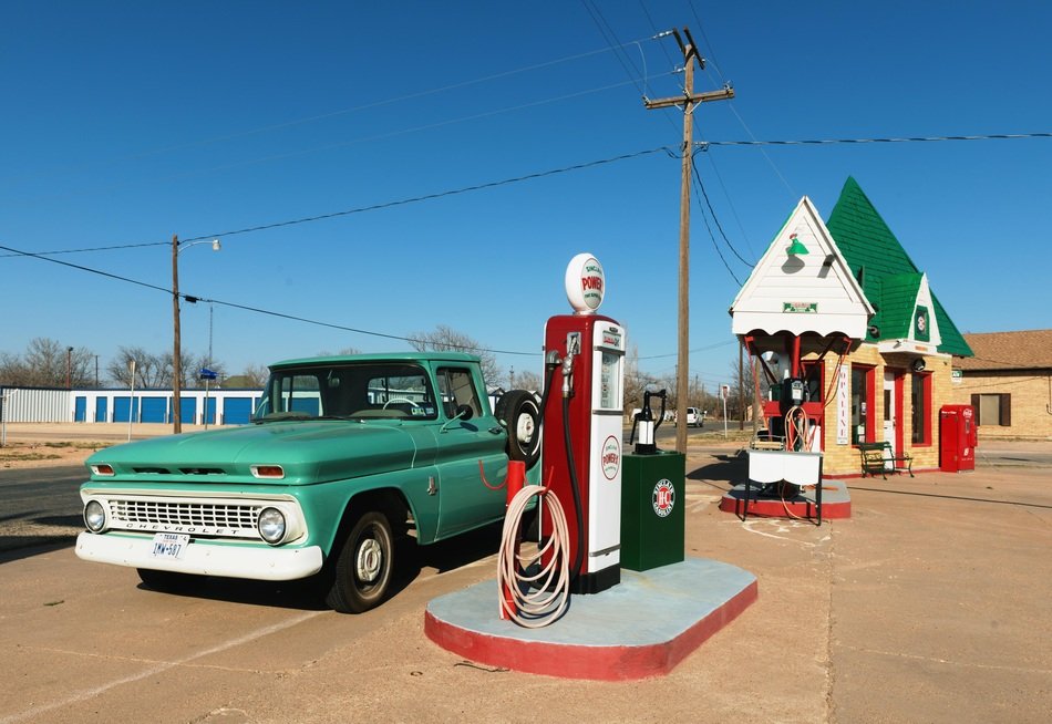 vintage green car at Petrol Stations with Workshop and Garage