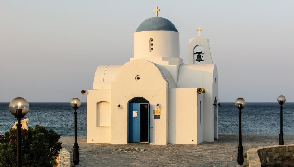 Beautiful blue and white church on the coast