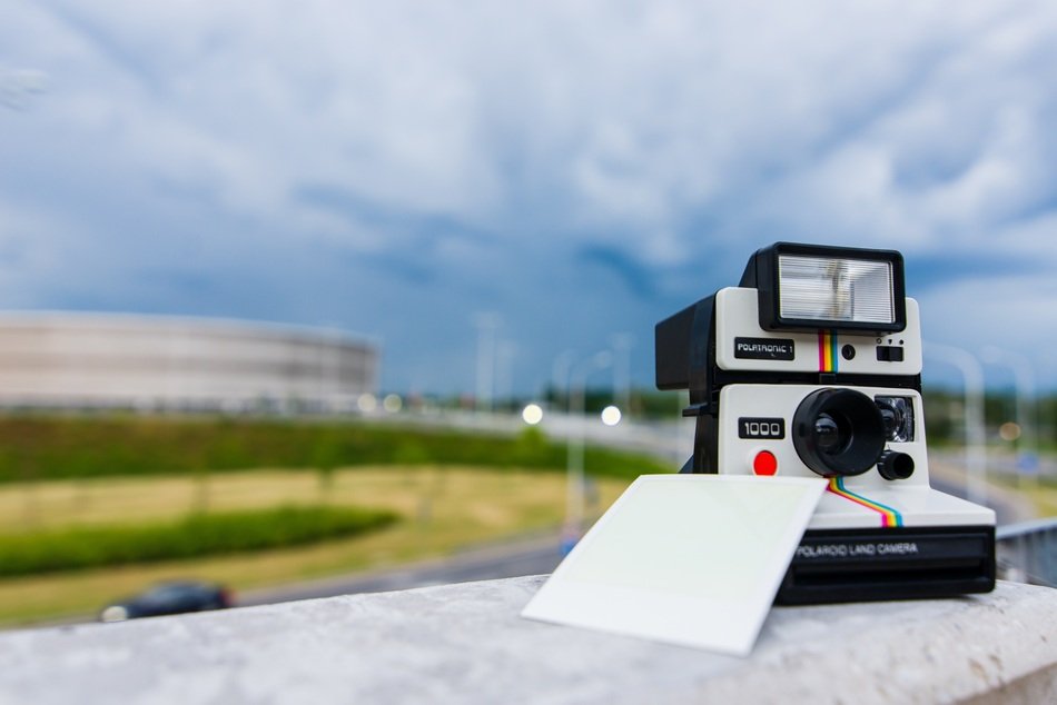 Polaroid on a table with image