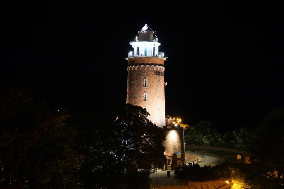 Lighting lighthouse at night