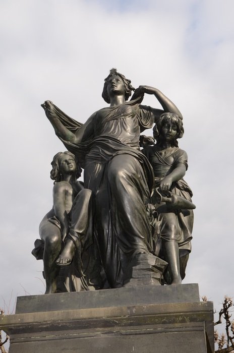sculpture of woman with two child girls in germany, Dresden