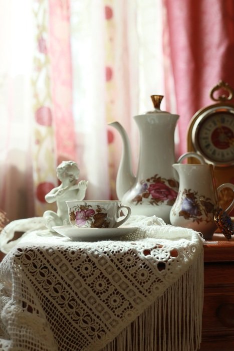 tea set on the table in a cozy room