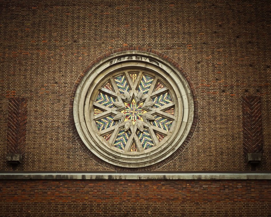 stained glass round window on the facade of the church