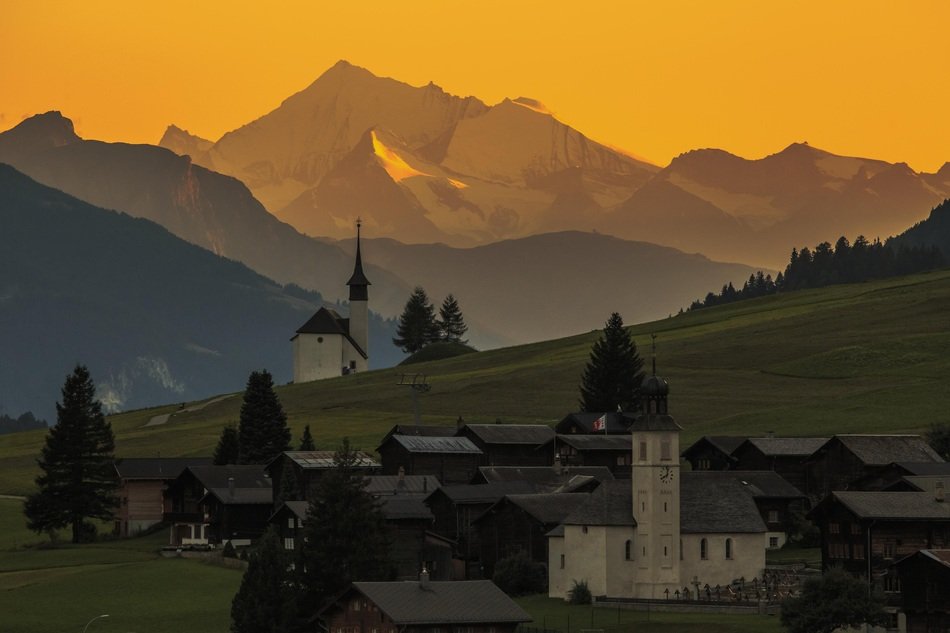 palace against the background of mountains in switzerland