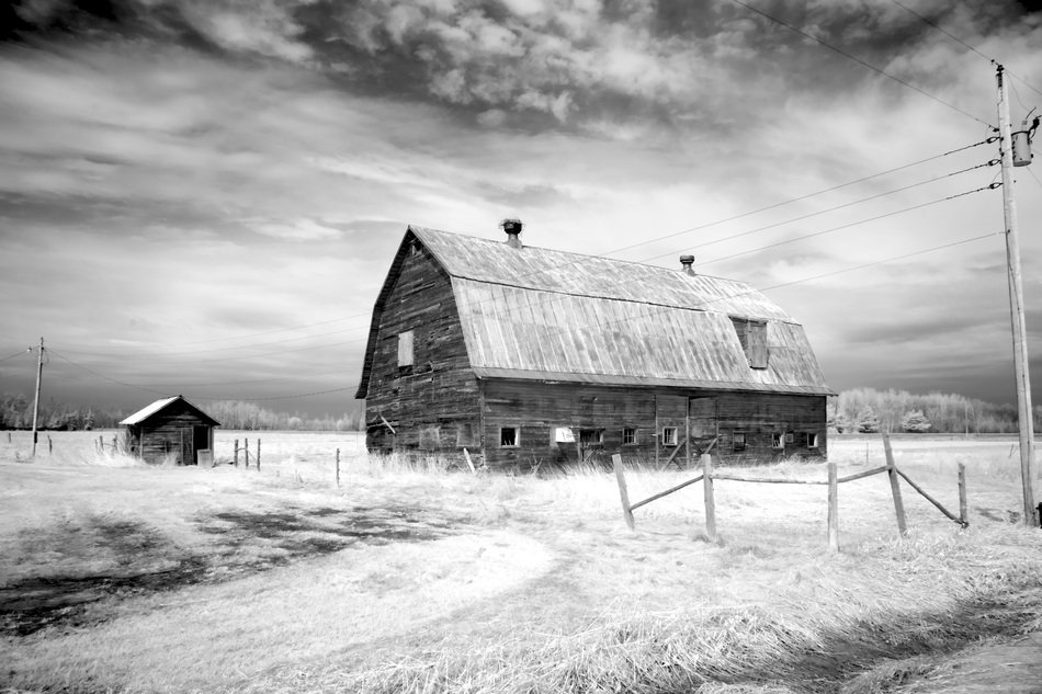 farm on the background of a stormy sky