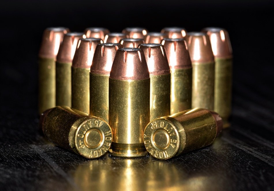 brass bullets on the table