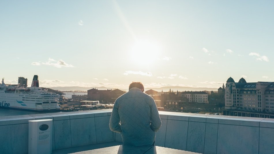 man on the ship at sunset