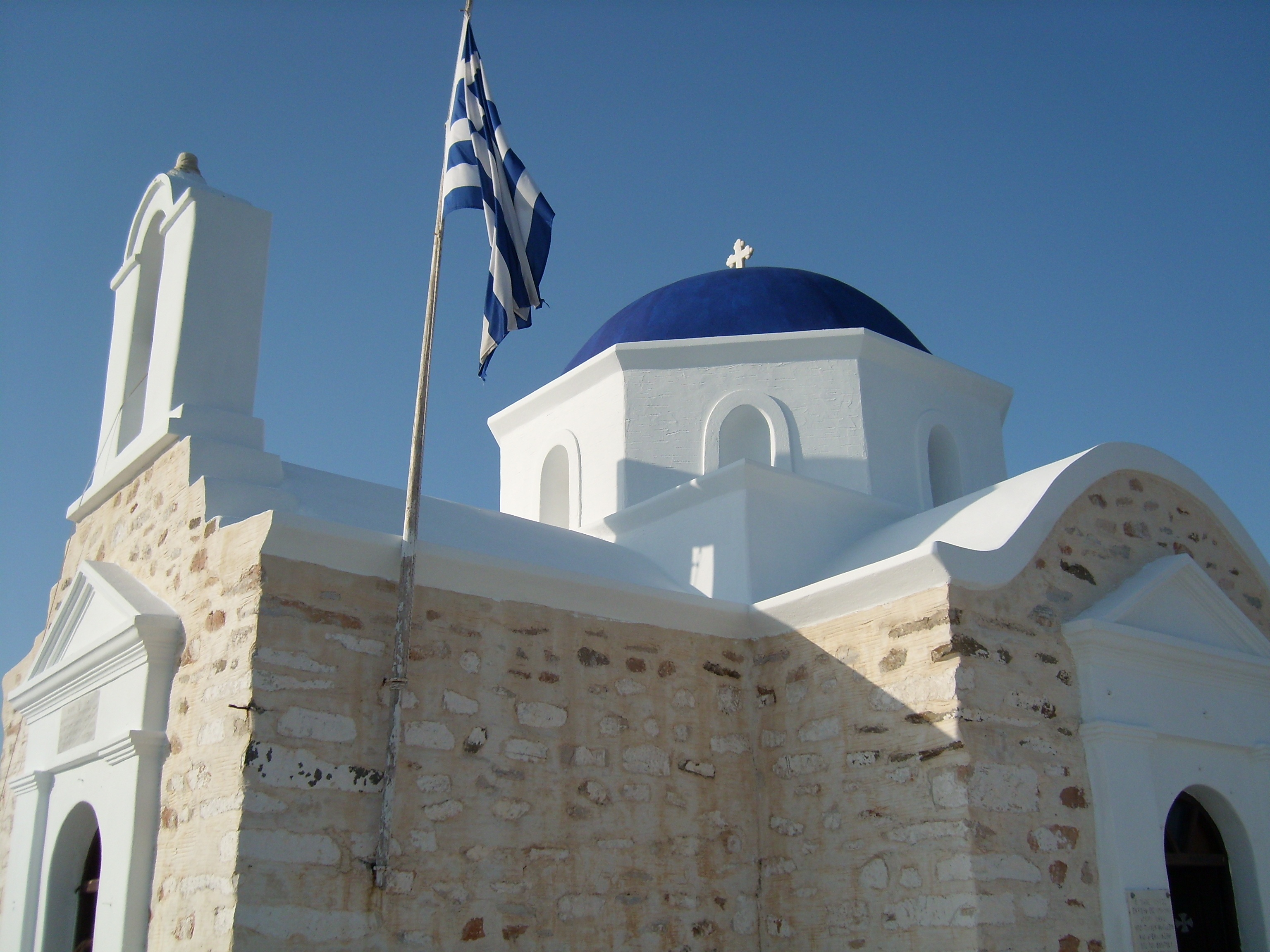 White church with blue dome in greece free image download