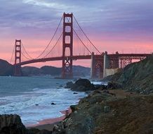 bridge over the river during sunset