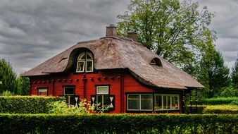Landscape with the red house in Netherlands