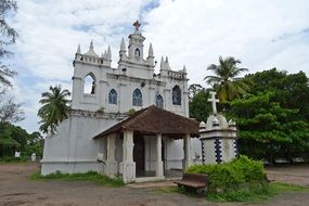 church near trees in india