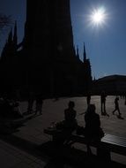 people on benches on Cathedral Square, germany, munich