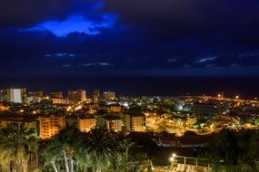 night lights of city at Sea, spain, Canary Islands, Tenerife, puerto de la cruz