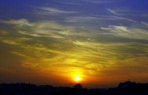 Dawn Sun on the silhouettes of barcelona