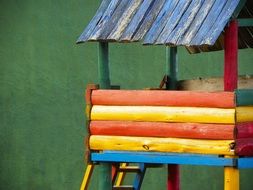colored wooden house in the park