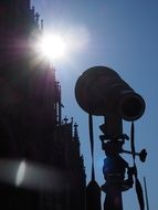 telephoto lens against the backdrop of Ulm Cathedral