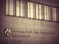 inscription on the facade of the district court