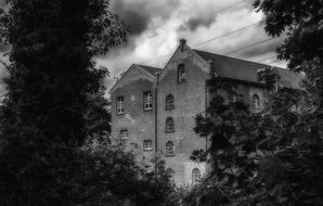 black and white photo of a mystical house