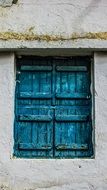 blue window shutters in cyprus