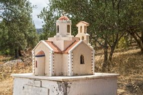 model of a temple on a mediterranean island