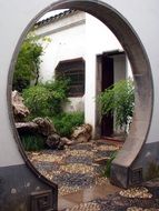 round entrance doors to the courtyard