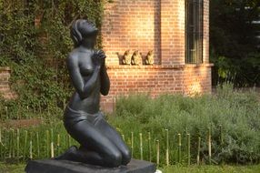 praying girl- garden statue
