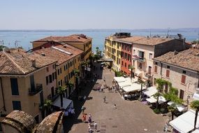 panoramic view of a street in the city of sirmione