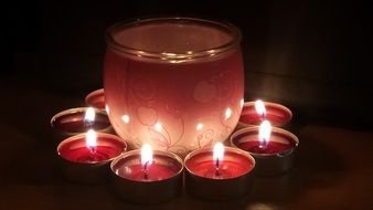 red candles on the table at night