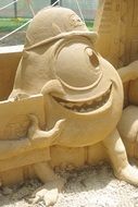 monster sculptures made of sand