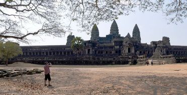 distant view of the temple complex in cambodia