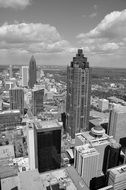 Aerial view of city with high buildings, black and white image