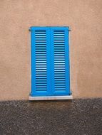 blue window shutter closed