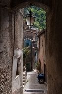 narrow streets between old houses in Borgo, Italy