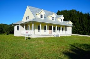 New House For Sale on lawn at forest