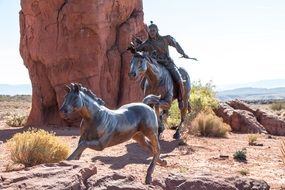 bronze sculpture depicting the wild west in America