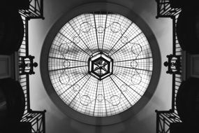 black and white photo of the internal dome of the building